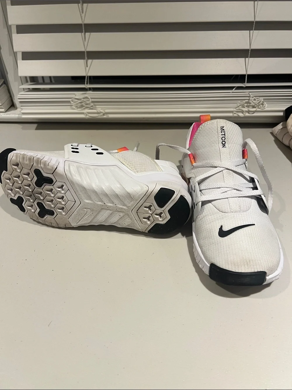 Nike White Metcon Training Shoes with Black Swoosh and Pink/Orange Pull Tabs